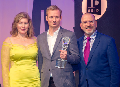 SBID Master of Design 2019, Chris Godfrey collecting his Award at the SBID International Design Awards 2019